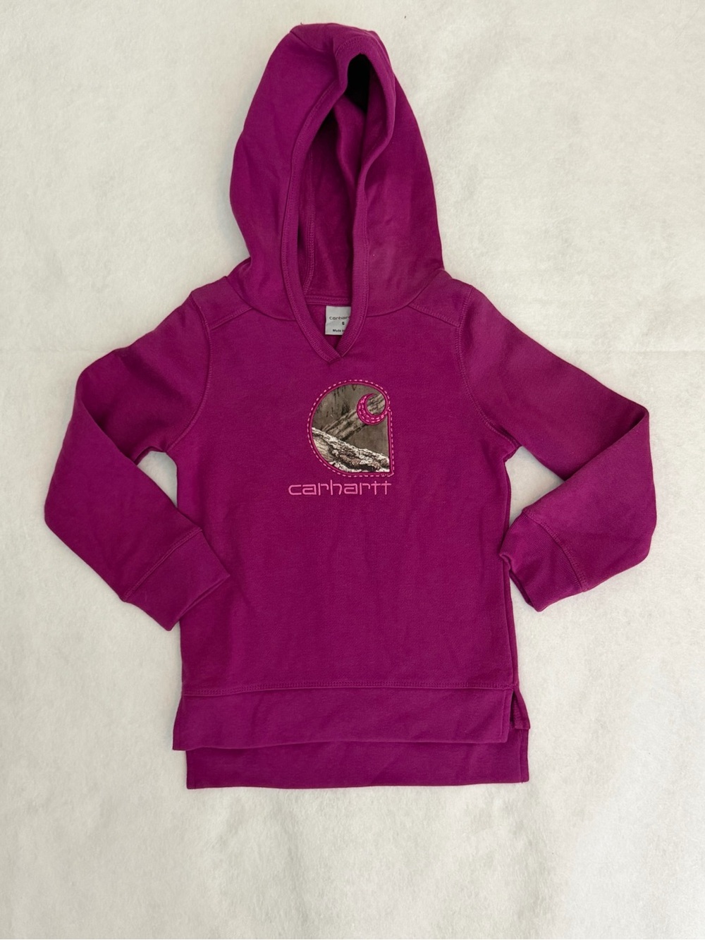 Carhartt girls' hooded sweatshirt featuring a distinctive camo graphic logo
